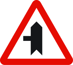 Priority intersection over road on the left