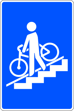 Pedestrian underpass with rail or ramp for cycles