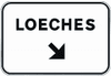 Sign over the carriageway on a conventional road. Immediate exit towards a conventional road