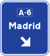 Sign over the carriageway on a conventional road. Immediate exit towards a motorway or dual carriageway